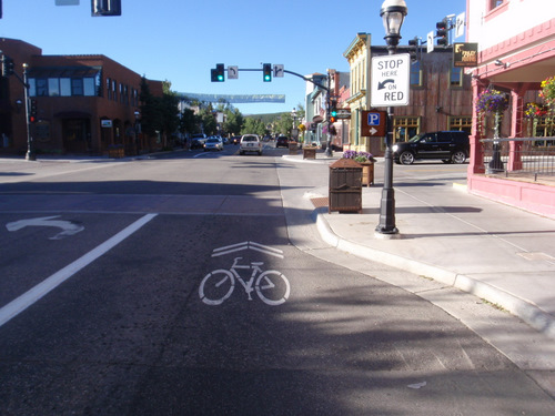 It is a 'Sharrow' (acronym for Shared Lane Arrow).